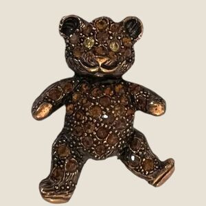 1928 brand teddy bear brooch, copper color with yellow rhinestones